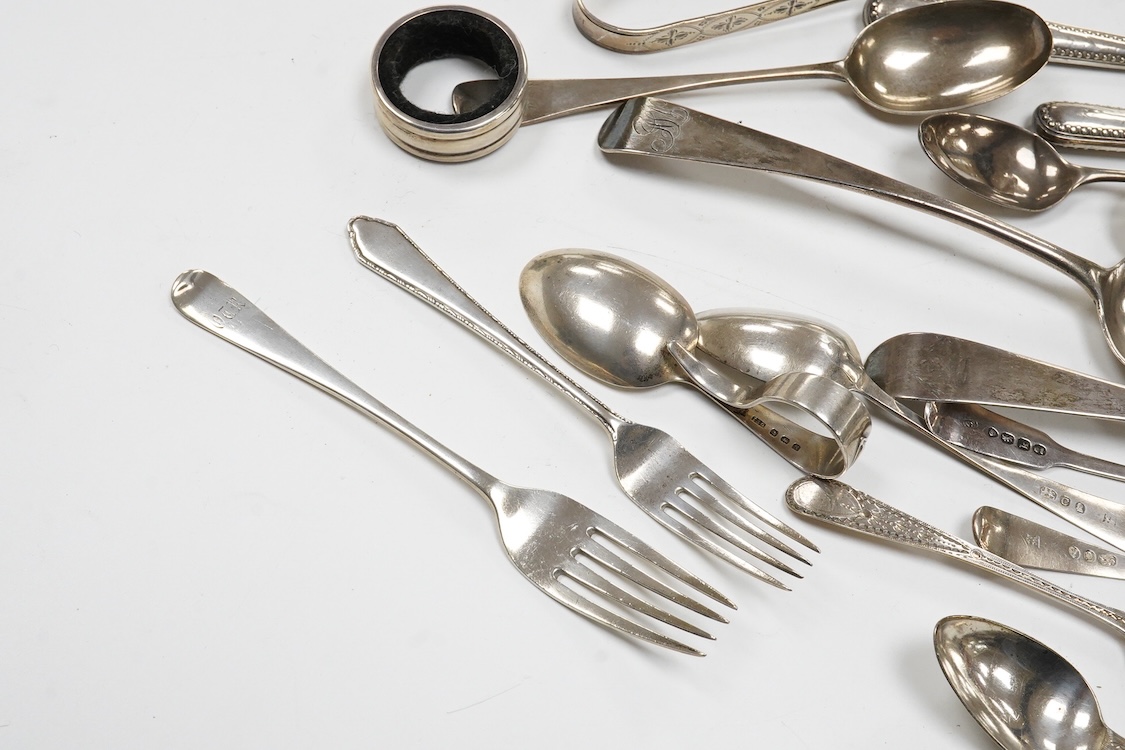 A collection of small silver and white metal items, including an Indian Hamilton & Co small dish, the centre inset with 1840 one rupee coin, one other white metal dish, two modern silver mounted napkin rings, fourteen as